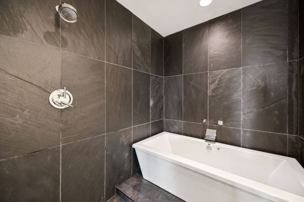 Travis_006 Henderson/Knox Bathroom Remodel. Upgraded shower tile and waterproofing for a condo resident.